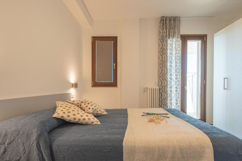 Postel nebo postele na pokoji v ubytování I GELSI B&B