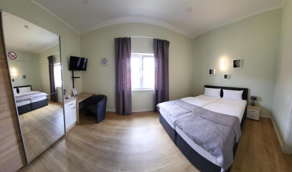 Postel nebo postele na pokoji v ubytování Lutz Motel