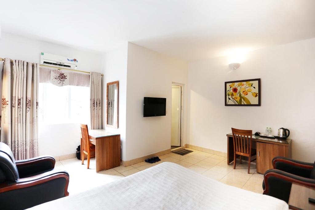 TV a/nebo společenská místnost v ubytování Especen Hotel