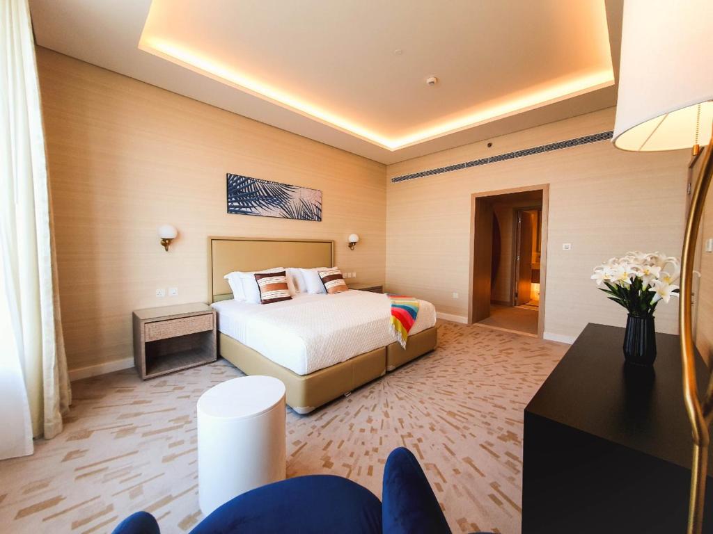 a hotel room with a bed in a room at ORION in Dubai