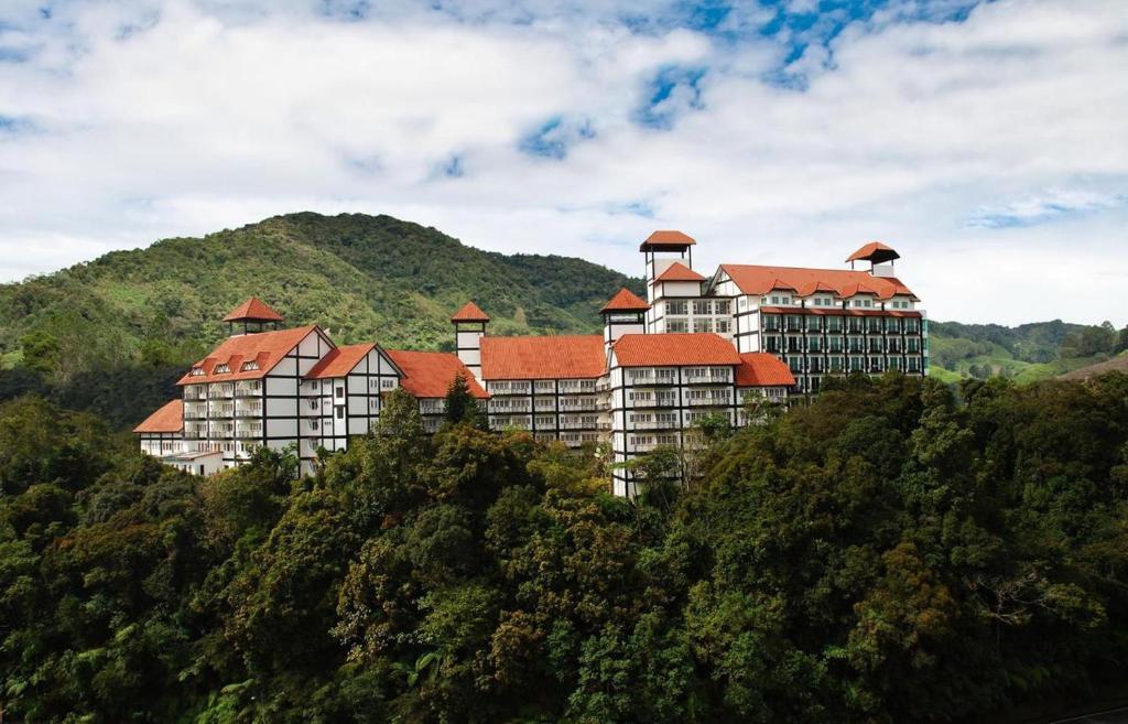a large building on top of a mountain at Heritage Hotel Cameron Highlands in Cameron Highlands