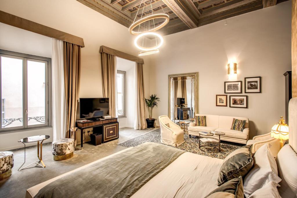 TV a/nebo společenská místnost v ubytování Martius Private Suites Hotel