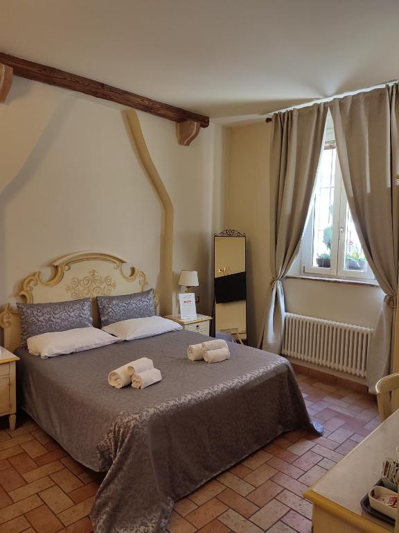 Postel nebo postele na pokoji v ubytování Casa Aurora