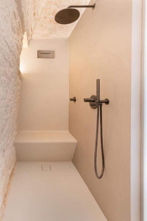 Kúpeľňa v ubytovaní Suite21 - The Trulli Experience