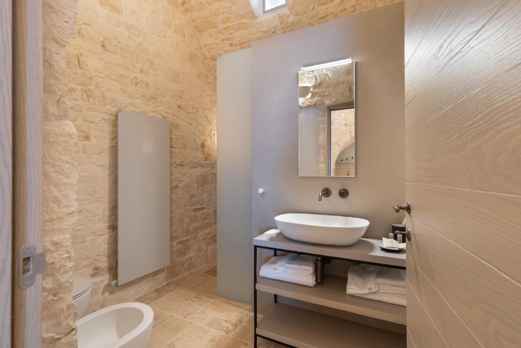 Kúpeľňa v ubytovaní Suite21 - The Trulli Experience