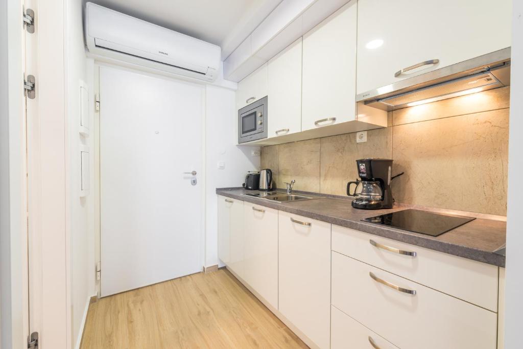 Kuchyňa alebo kuchynka v ubytovaní Studios Manhattan