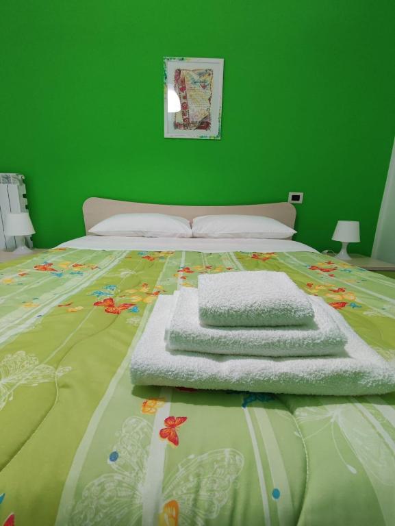Postel nebo postele na pokoji v ubytování Prima Luce