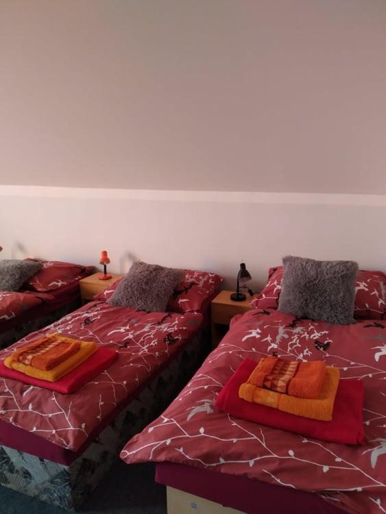 Postel nebo postele na pokoji v ubytování LEO - PENZION