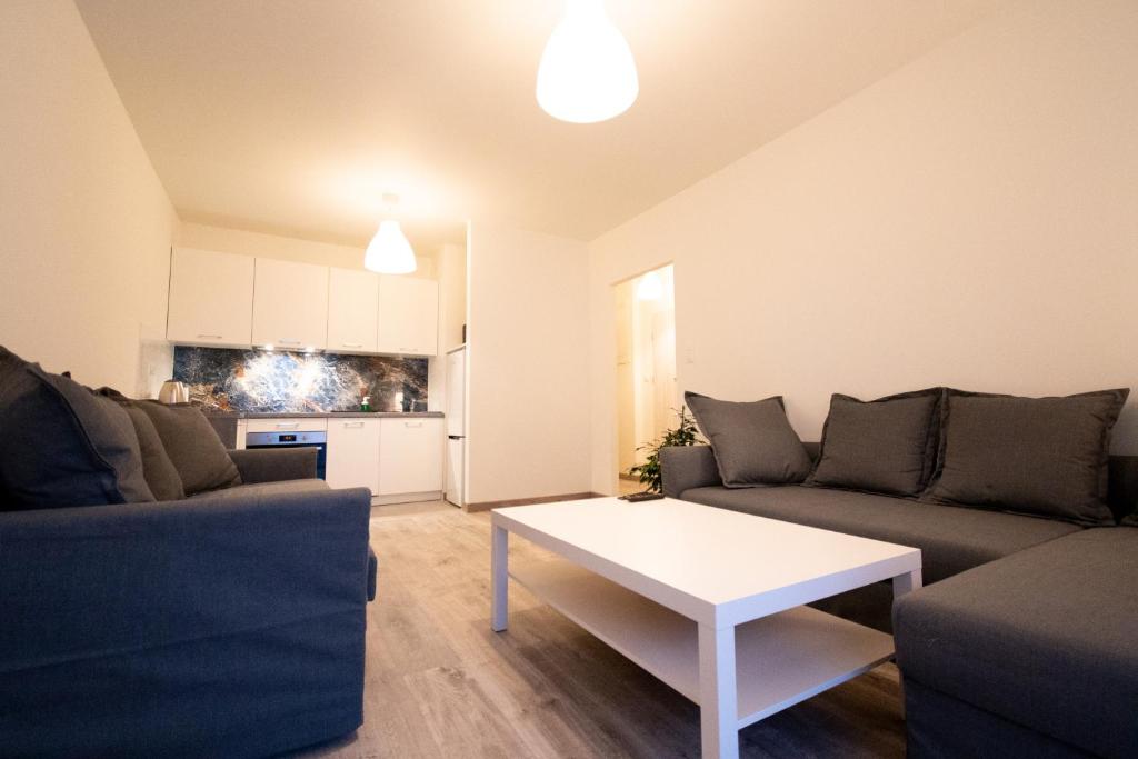 Posedenie v ubytovaní Apartament Charlie