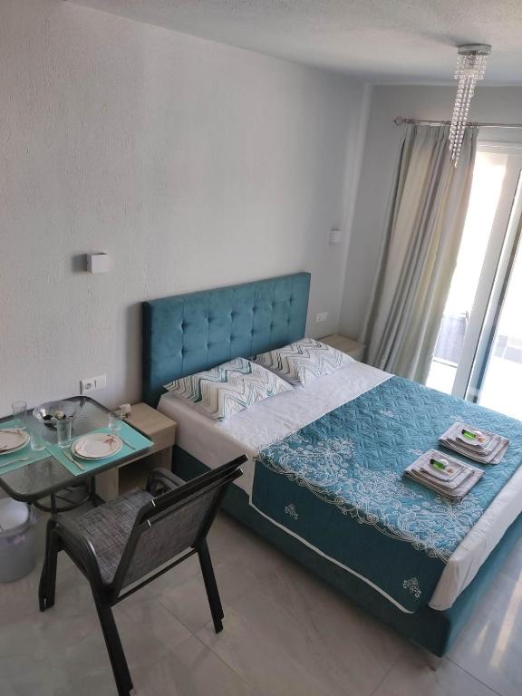 Łóżko lub łóżka w pokoju w obiekcie Mei's luxury apartments