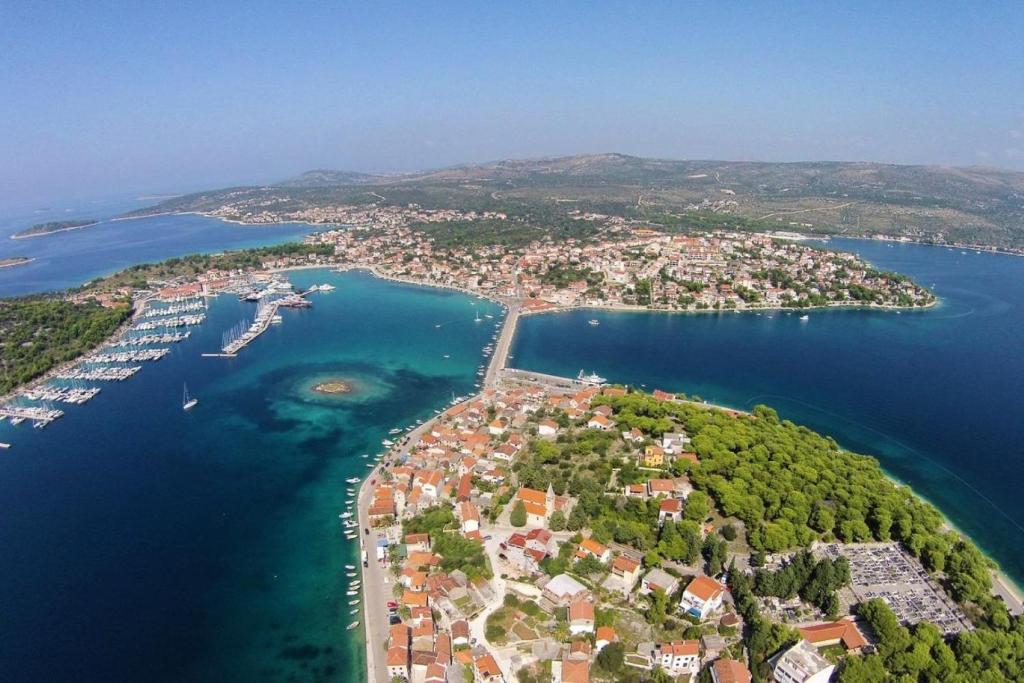 an aerial view of a small island in the water at Apartments Lias - with restaurant in Rogoznica