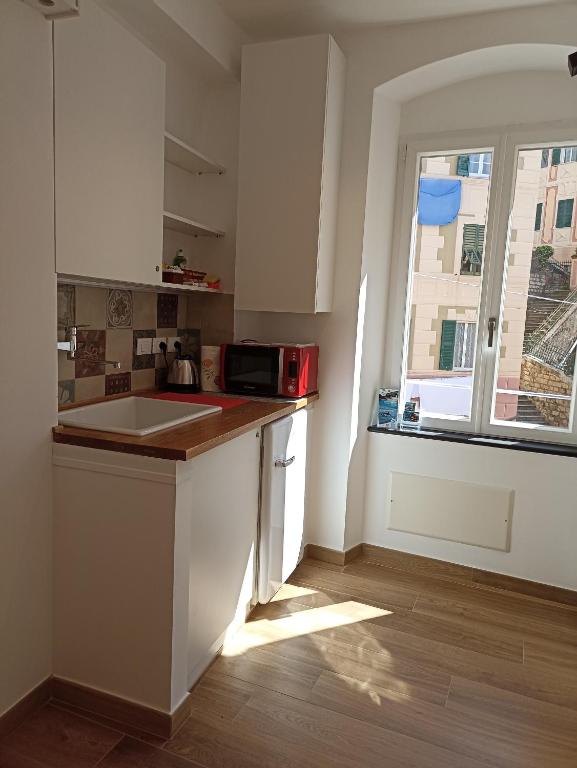 Кухня или мини-кухня в Al Porto 61 - Rooms for Rent
