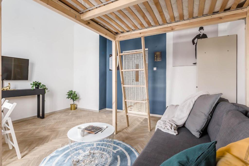 Televízia a/alebo spoločenská miestnosť v ubytovaní Chill Apartments Ogrodowa