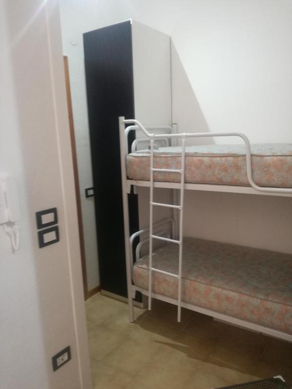 Posteľ alebo postele v izbe v ubytovaní la casa di enzo