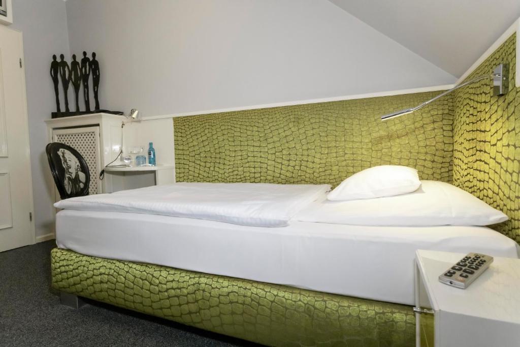 Postel nebo postele na pokoji v ubytování Haus Gerbens