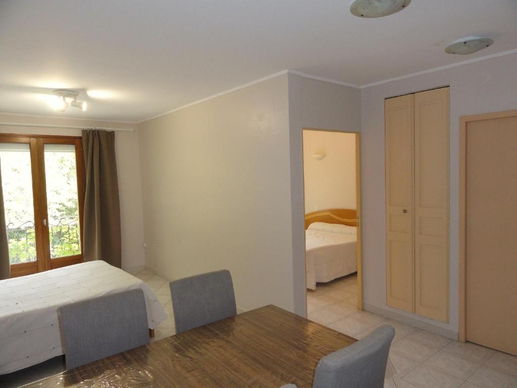 Postel nebo postele na pokoji v ubytování Hotel de l'île