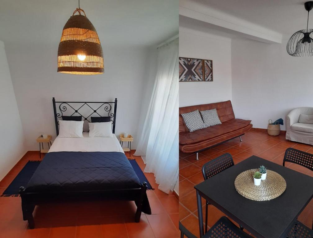 1 dormitorio con 1 cama y sala de estar en Porta Reguengos - Apartamento moderno Alentejo central, en Reguengos de Monsaraz
