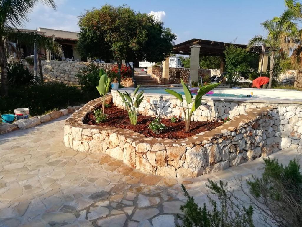 Zahrada ubytování RESIDENCE CON PISCINA