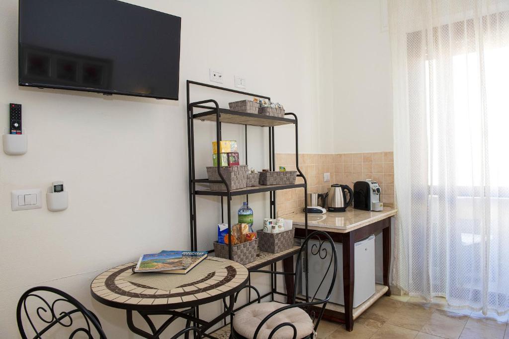 Kuchyň nebo kuchyňský kout v ubytování B&B I Gerani
