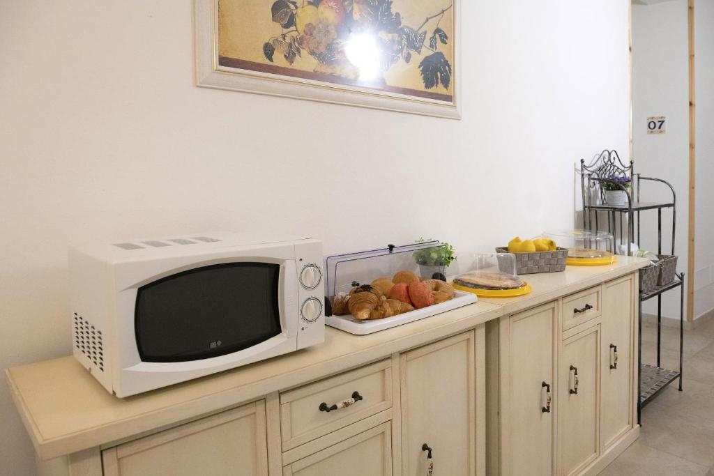 Kuchyň nebo kuchyňský kout v ubytování B&B I Gerani