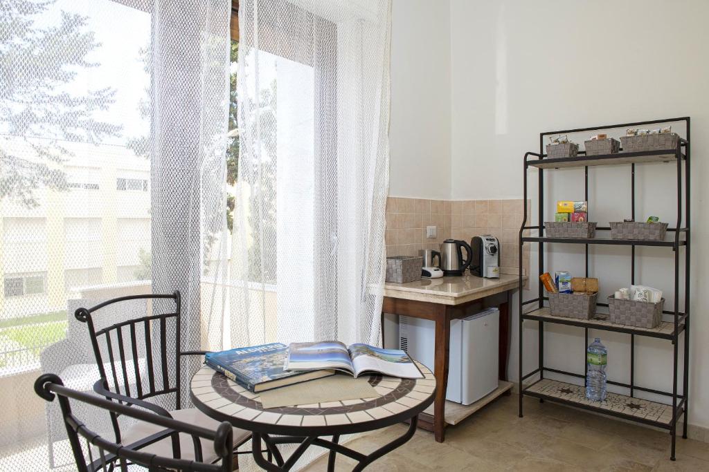 Příslušenství pro přípravu čaje a kávy v ubytování B&B I Gerani