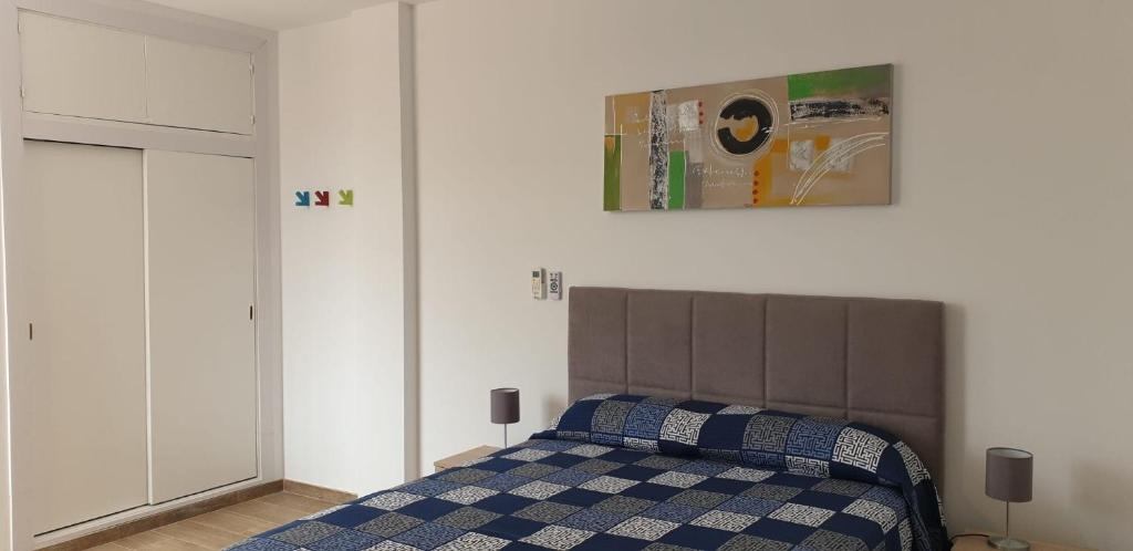 Postel nebo postele na pokoji v ubytování Apartamento Rulosol 5