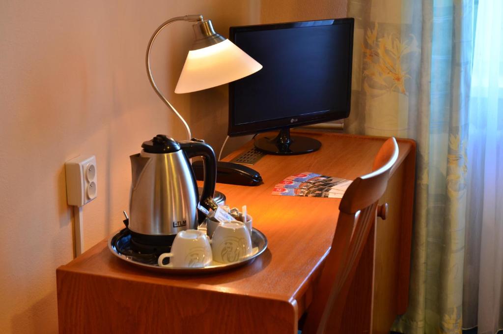 Telewizja i/lub zestaw kina domowego w obiekcie Hotel Panorama
