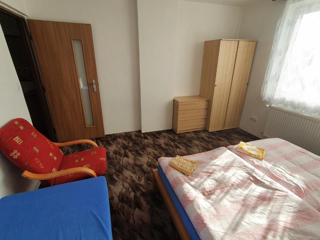 Postel nebo postele na pokoji v ubytování Holiday Home U Čápů