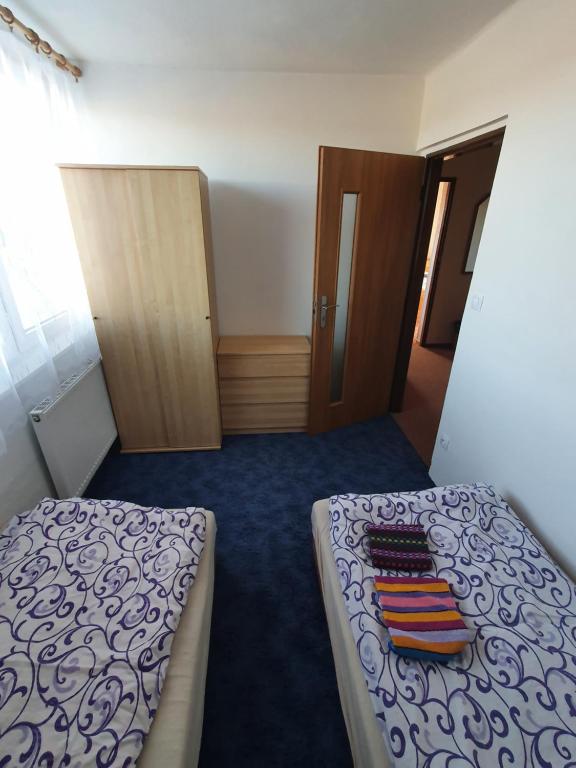 Postel nebo postele na pokoji v ubytování Holiday Home U Čápů