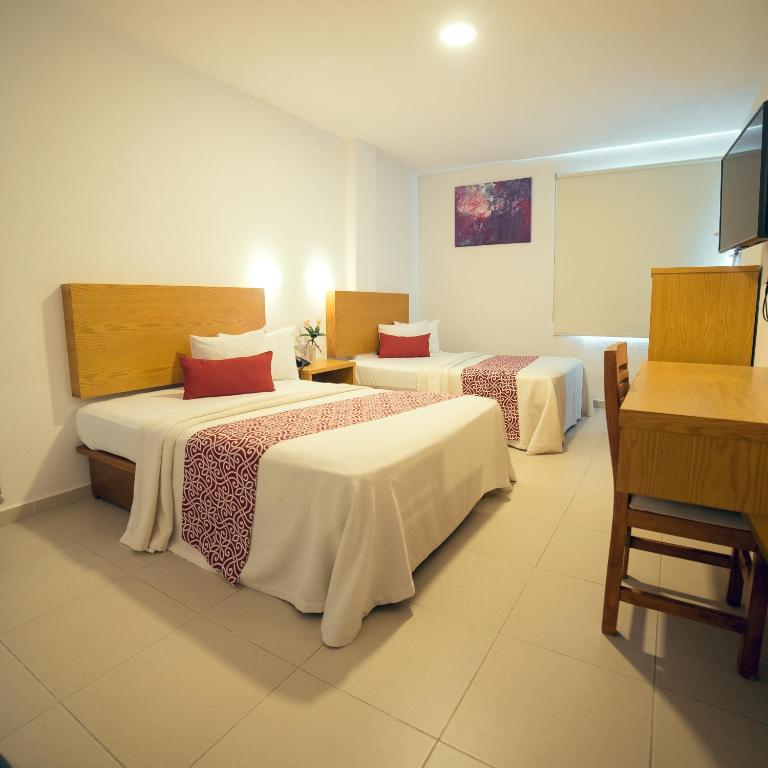 Postel nebo postele na pokoji v ubytování Hotel Klimt