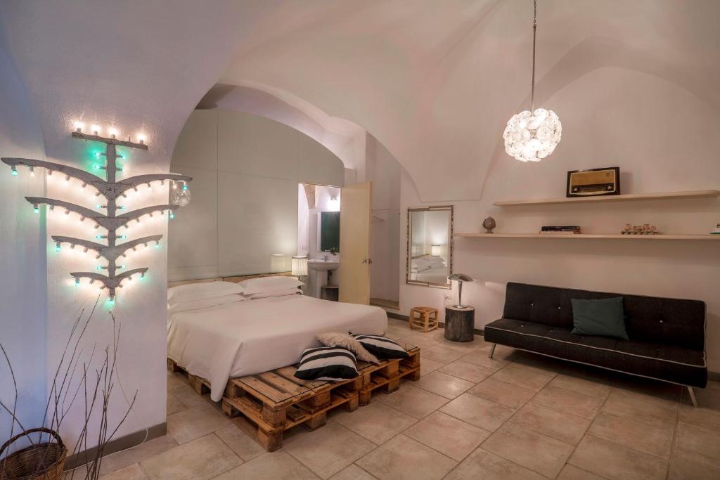 Postel nebo postele na pokoji v ubytování B&B Corte Dei Romiti - Lecce Selection