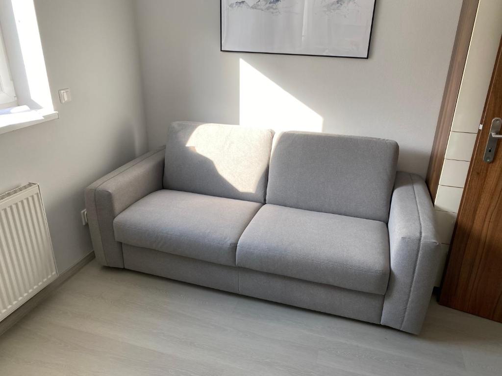 Posezení v ubytování Apartmán v Koutech