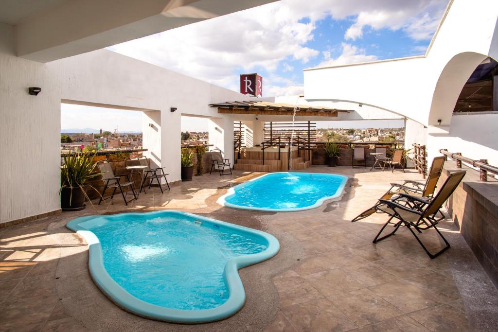 Bazén v ubytování Hotel El Relicario nebo v jeho okolí