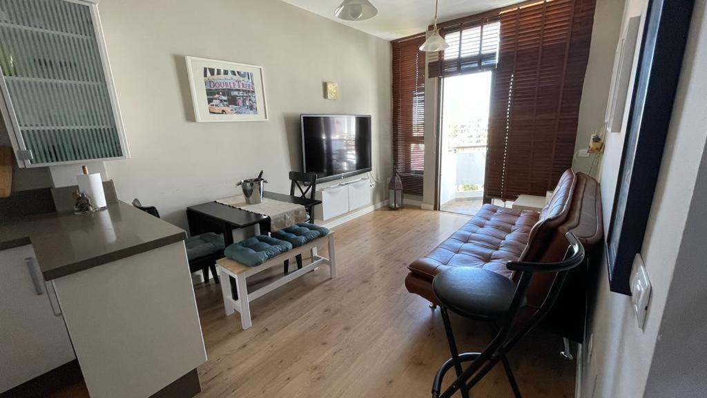 TV a/nebo společenská místnost v ubytování Apartamento en Playa del Ingles CC Yumbo