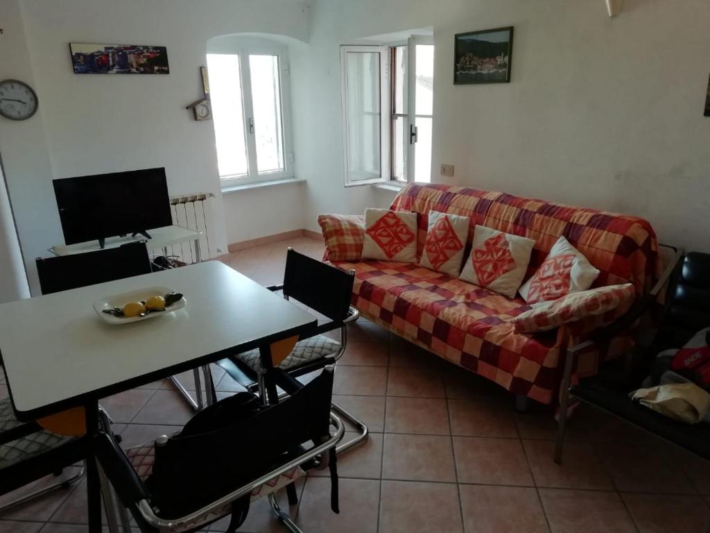 TV a/nebo společenská místnost v ubytování La Terrazza nel carrùggio