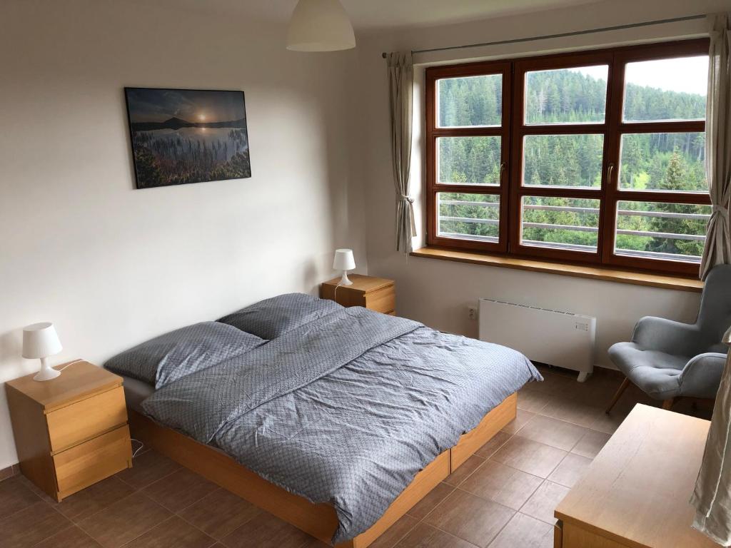 Postel nebo postele na pokoji v ubytování Cihlarka 301