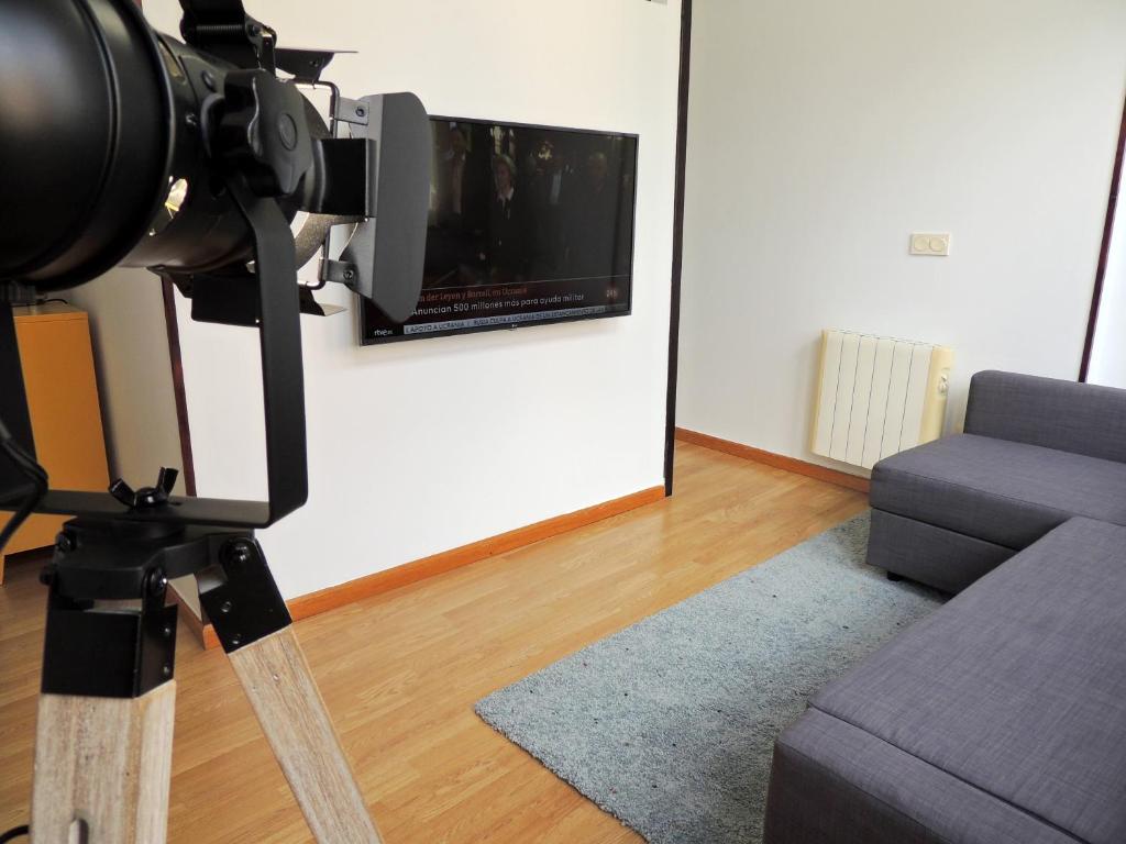 A television and/or entertainment centre at Casa Aurea-Apartamento zona antigua,parking y wifi by DeLabra Apartments