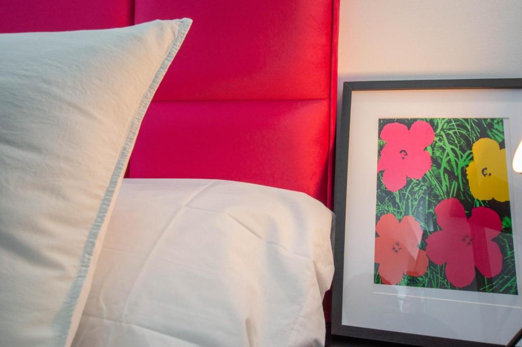 Postel nebo postele na pokoji v ubytování Apartamentos Élite - Art Collection - Andy