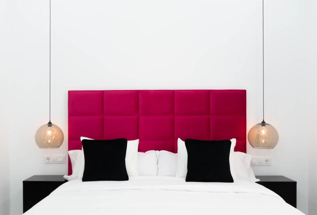 Postel nebo postele na pokoji v ubytování Apartamentos Élite - Art Collection - Andy