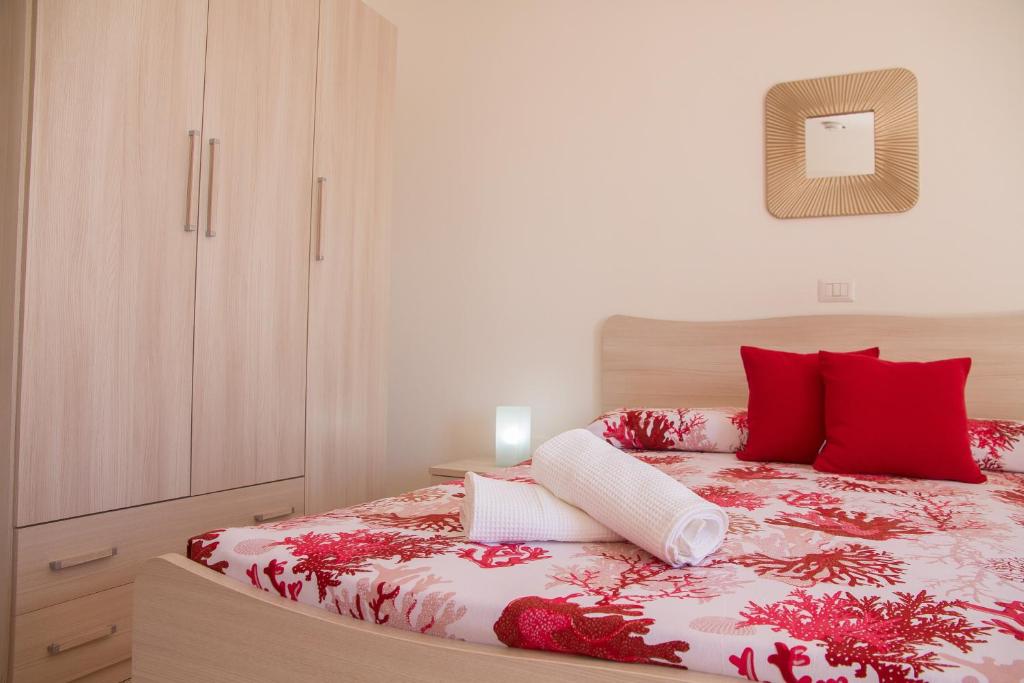 Postel nebo postele na pokoji v ubytování BluRiva Hotel