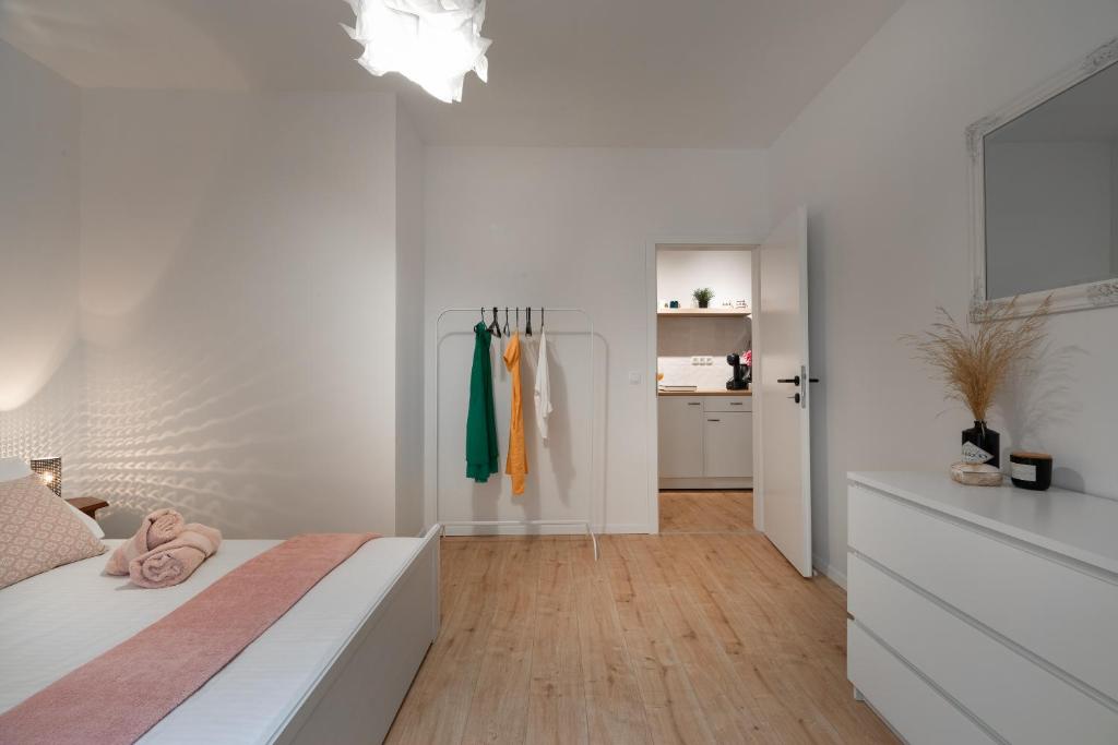 Łóżko lub łóżka w pokoju w obiekcie Apartment Brandesa