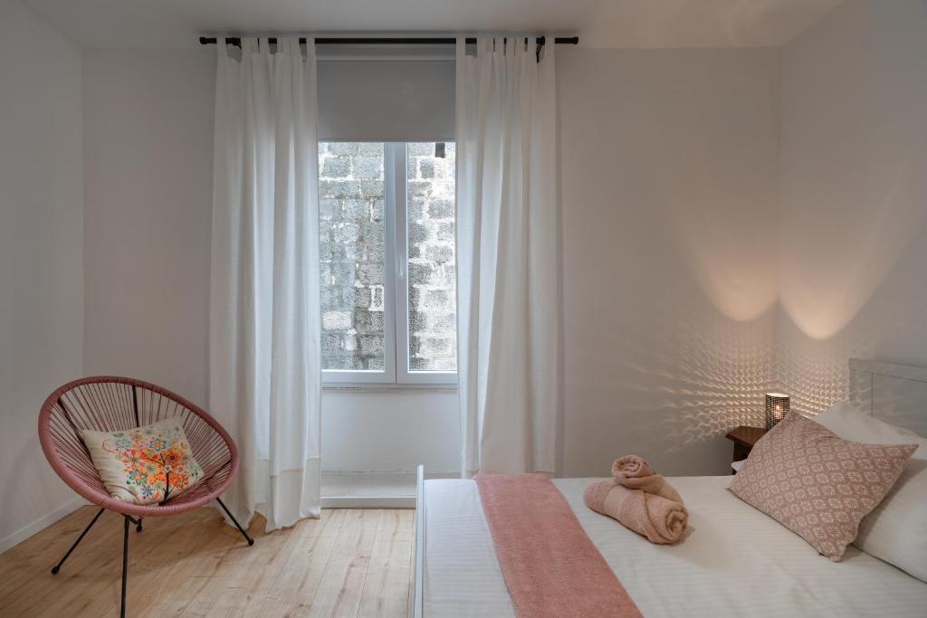 Łóżko lub łóżka w pokoju w obiekcie Apartment Brandesa