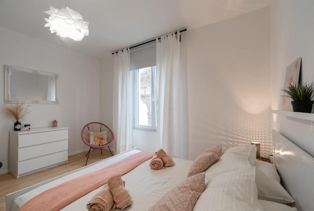 Łóżko lub łóżka w pokoju w obiekcie Apartment Brandesa