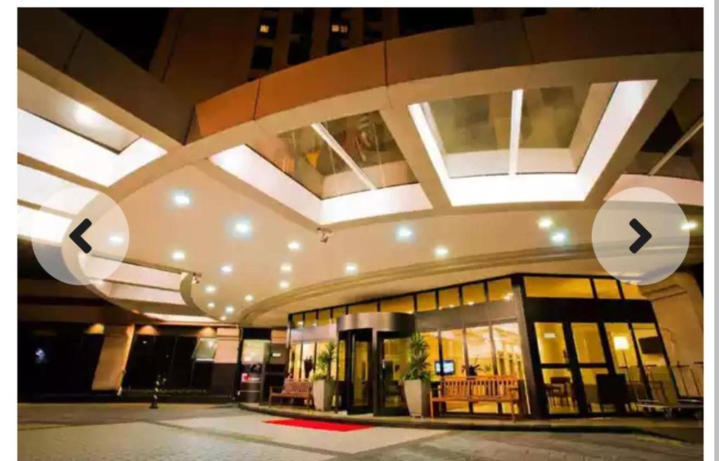 a large building with lights on the ceiling at Maravilhoso Flat ao lado de Congonhas! in Sao Paulo