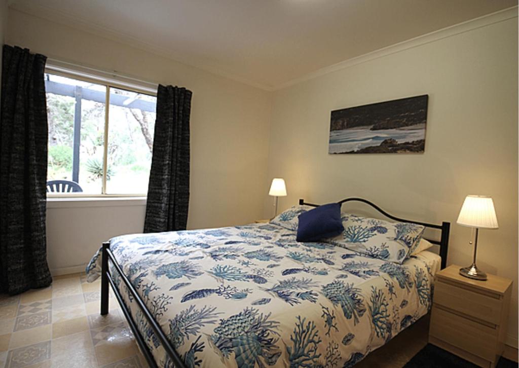 Postel nebo postele na pokoji v ubytování Kangaroo Island Coastal Villas