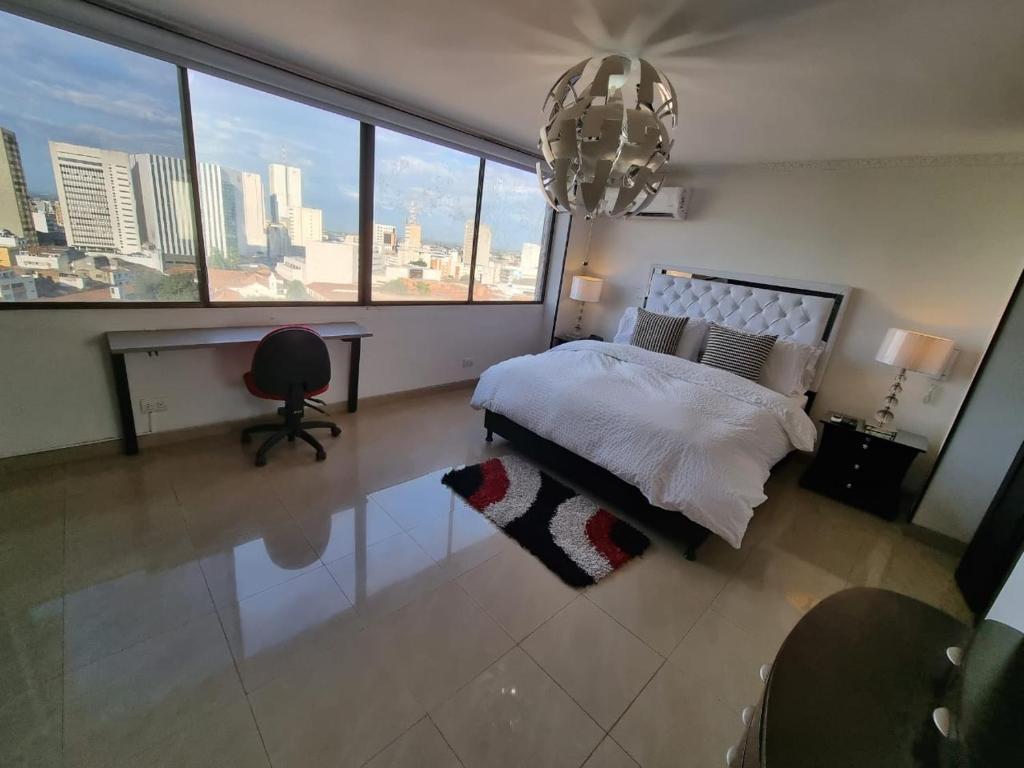 Ένα ή περισσότερα κρεβάτια σε δωμάτιο στο Penthouse