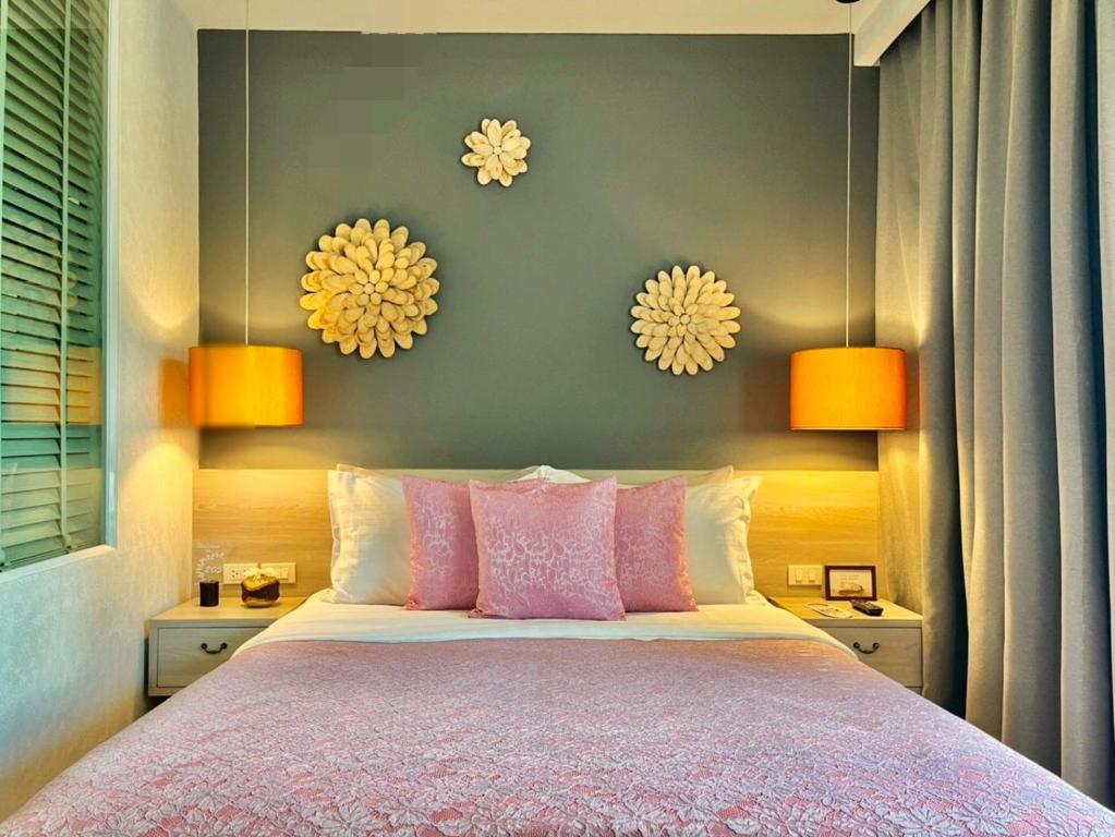 Postel nebo postele na pokoji v ubytování Mukrada House Boutique Hometel Krabi
