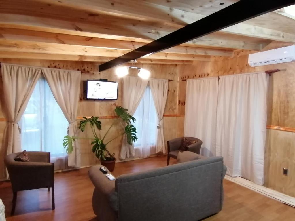 Posezení v ubytování Cabañas camelia