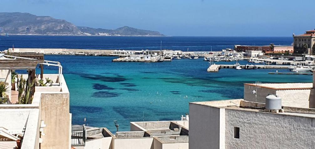 a view of a harbor with boats in the water at CASA TURCHESE in Favignana