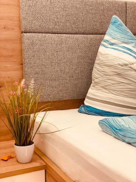 Postel nebo postele na pokoji v ubytování Almtalhotel Appartements in Pettenbach
